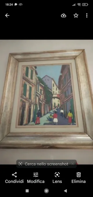 Quadro con cornice dorata e multicolore