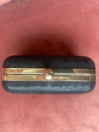 Bolso de fiesta negro y dorado