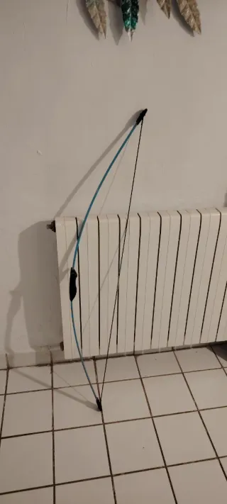 Diana tiro con dos arcos Decathlon Geologic.