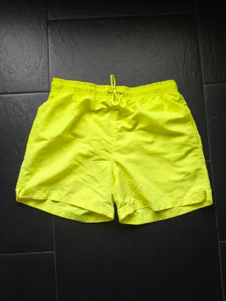 Costume da bagno giallo con tasche