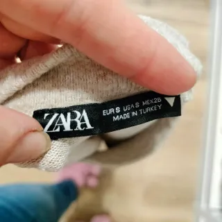 Jersey beige con perlas