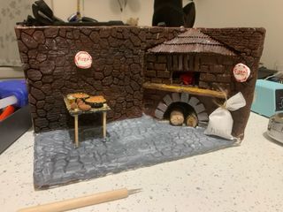 Scenografia presepe pizzeria forno a legna