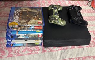 PS4 Slim Nera + 2 Controller + 7 Giochi