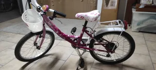 Bicicletta bambina rosa con cestino