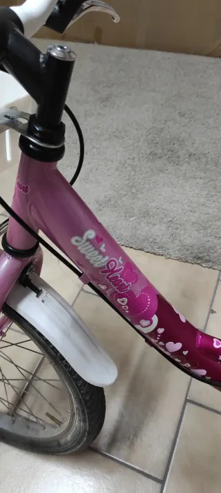 Bicicletta bambina rosa con cestino