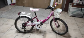 Bicicletta bambina rosa con cestino