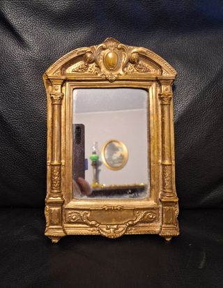 L70   Specchio da parete dorato