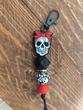 Portachiavi teschio con fiocco rosso