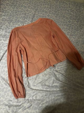 Blusa rosa bebé con encaje