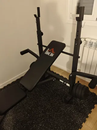 Banco de pesas y polea alta