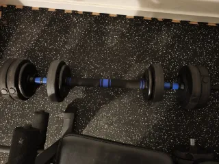 Banco de pesas y polea alta