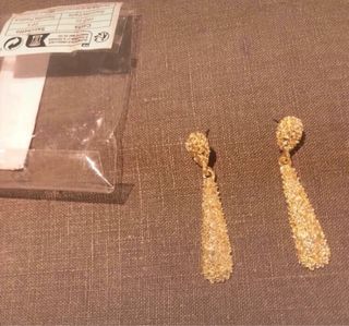 Pendientes dorados largos