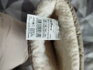 Botas y mono de nieve niños