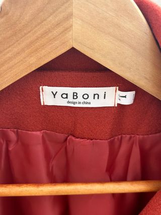 Abrigo Yaboni naranja tierra