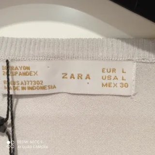 Jersey fino Zara gris perla con puños de diseño