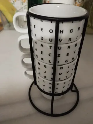 4 tazze da caffè con supporto