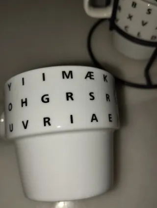 4 tazze da caffè con supporto