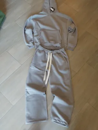 Tuta con lacci grigia taglia M