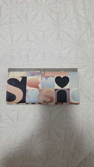 Cartera Tous multicolor con diseño de letras