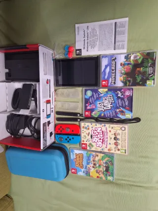 Nintendo Switch Lite + 4 Juegos + Accesorios