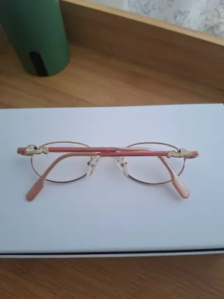 Gafas Snoopy infantiles doradas y rosas