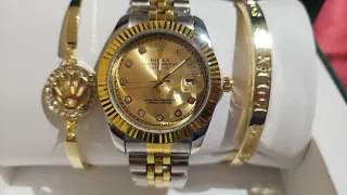 *Reloj de Acero, Oro y Plata.