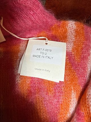 Jersey suave lana naranja y rosa con etiqueta