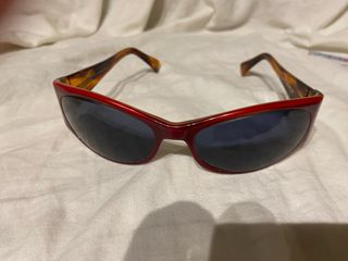 Gafas de sol Carolina Herrera rojas y marrones