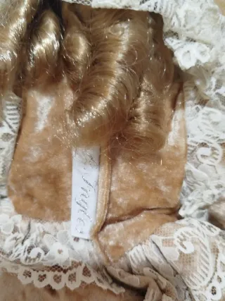 Muñeca de porcelanaa articulada