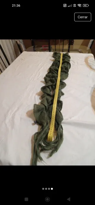 Bufanda verde botella con flecos