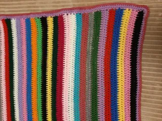 Manta de lana multicolor tejida a mano