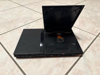 PS 2 Slim + controller, giochi e accessori