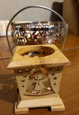 Portacandele in legno decorato