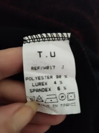 Top fiesta brillante cuello alto sin mangas