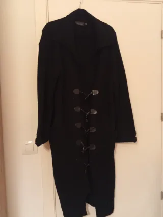 Chaquetón largo de punto con bolsillos