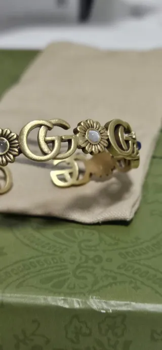 Bracciale Gucci GG con fiori turchese e blu