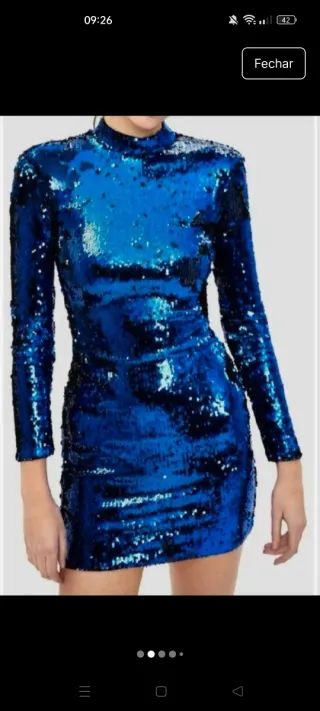 Vestido justo e curto de noite azul de lantejoulas