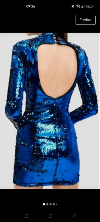 Vestido justo e curto de noite azul de lantejoulas