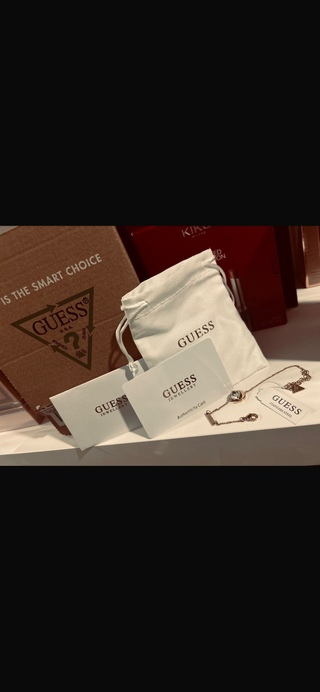 Pulsera Guess original dorada