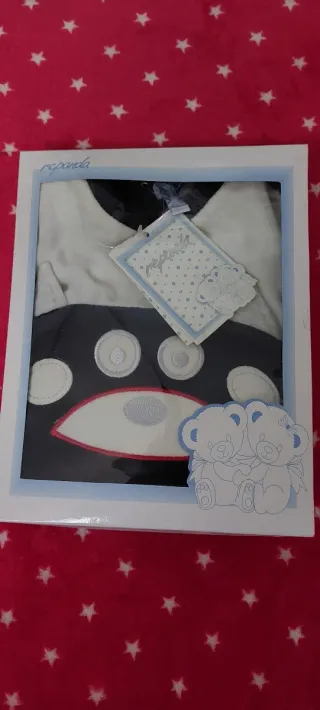 Pelele bebé azul y blanco con dibujo