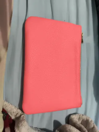 Monedero rosa lo vendo a mano