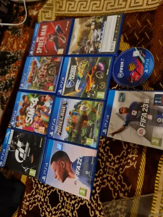 Lote 10 Juegos PS4 (Spider-Man, FIFA, Minecraft, S)