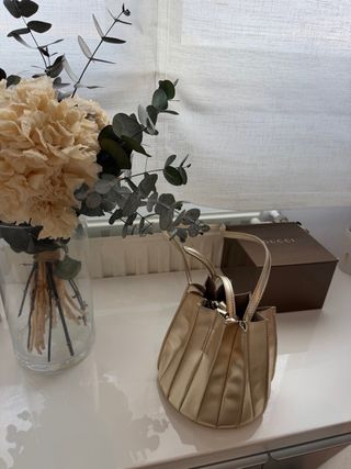 Bolso bandolera Cortefiel dorado