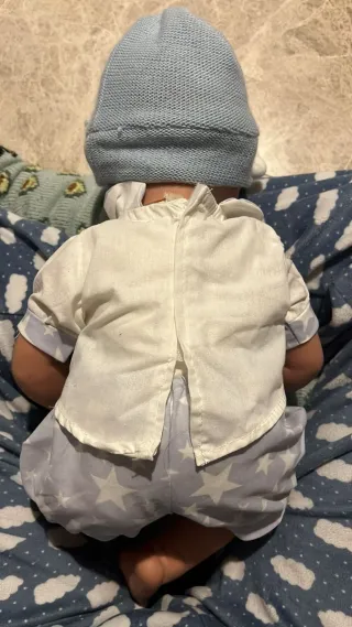 Muñeca realista con ropa