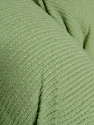 Divano in tessuto verde