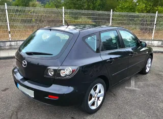 Escucho cambios Mazda 3 2006
