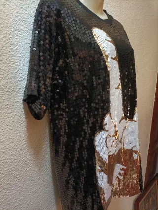 Camiseta lentejuelas negra y dorada