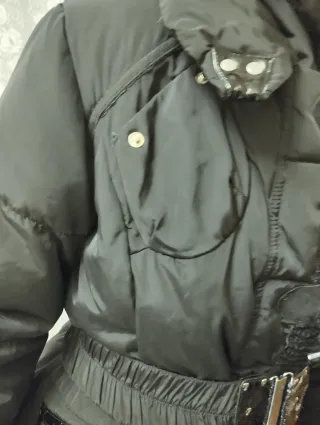 Chaqueta de plumas y pelo natural negra