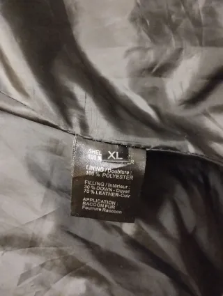 Chaqueta de plumas y pelo natural negra