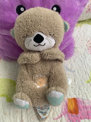 Nutria de peluche para dormir